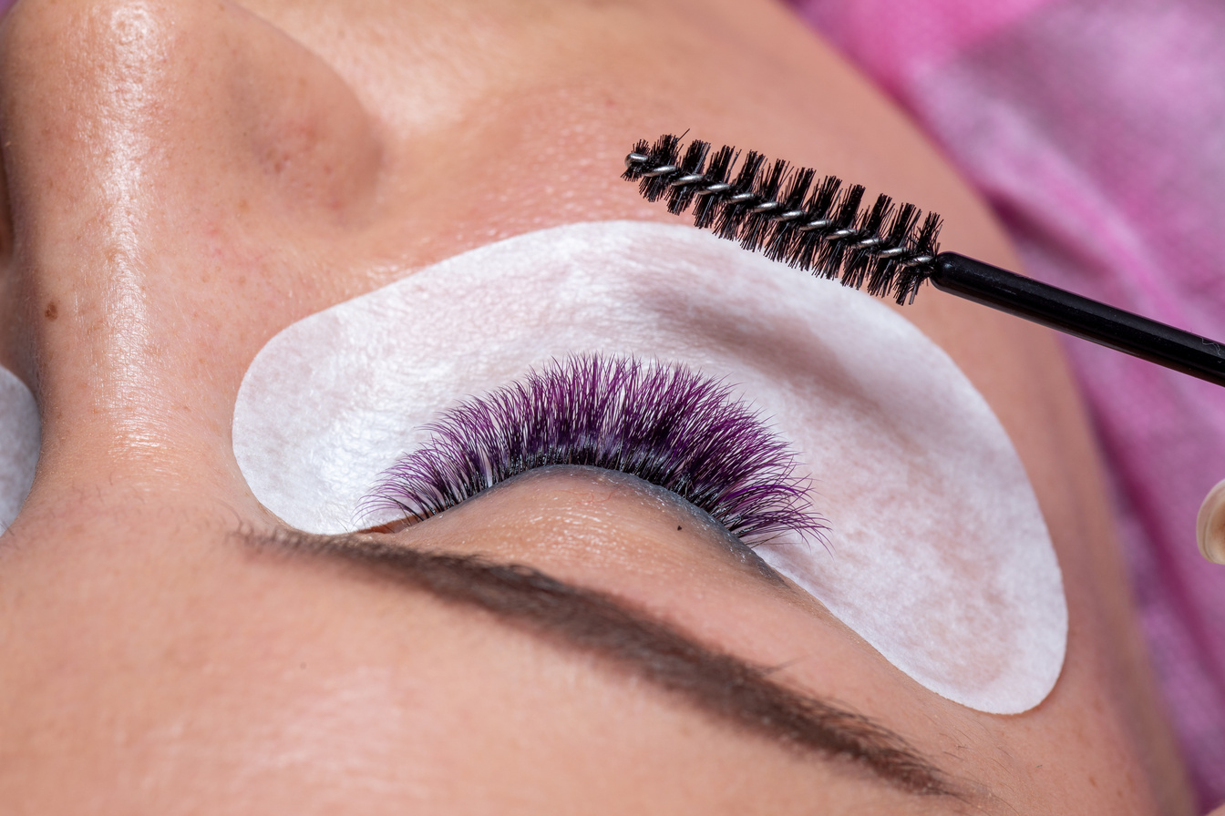 Treatment of Eyelash Extension with purple colorful lashes